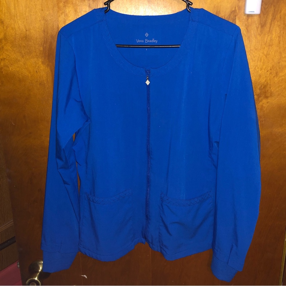 Vera Bradley blue Scrub jacket. Size small and In perfect condition
